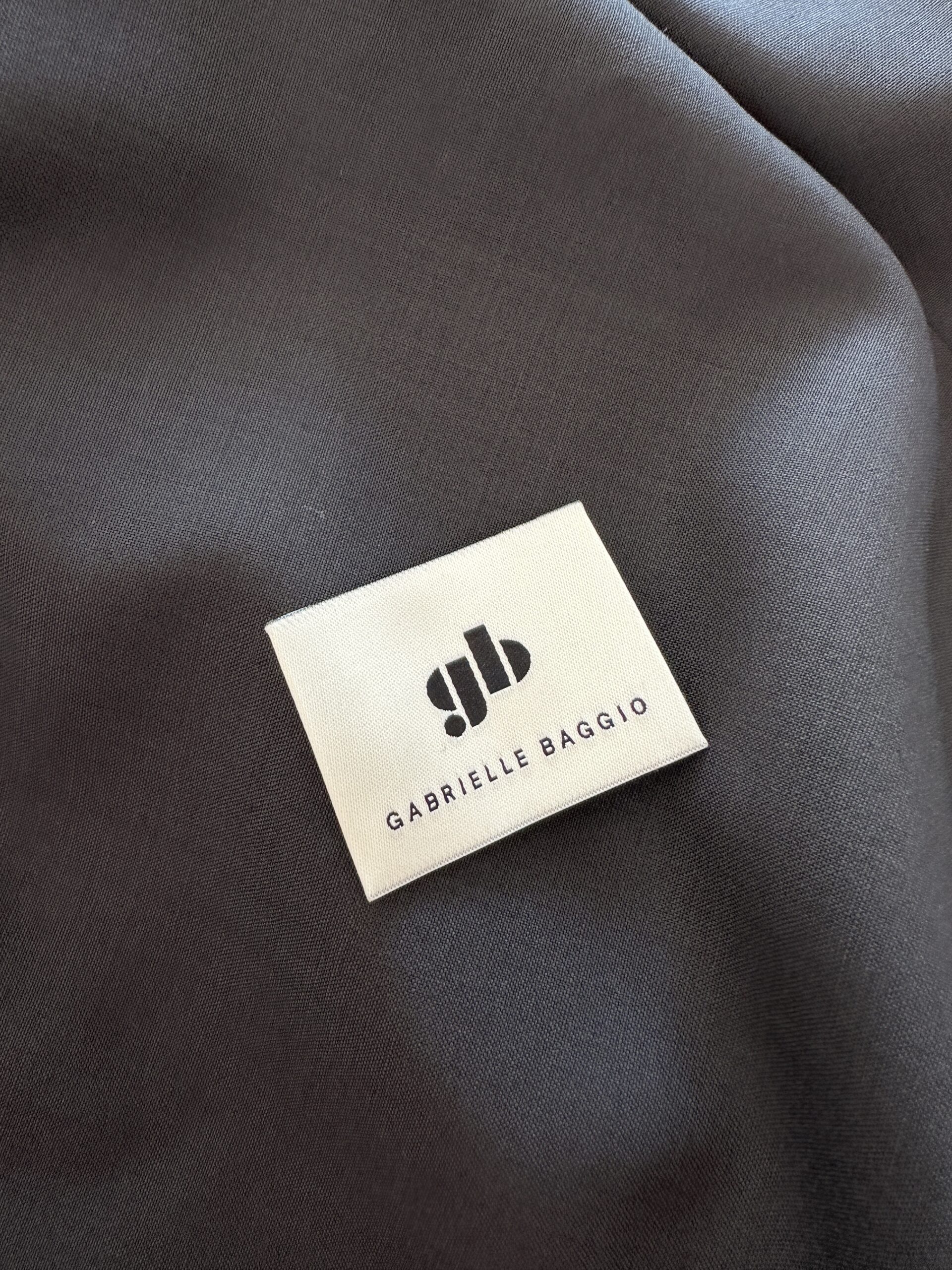 Étiquette de la marque de vêtements upcyclés Gabrielle Baggio